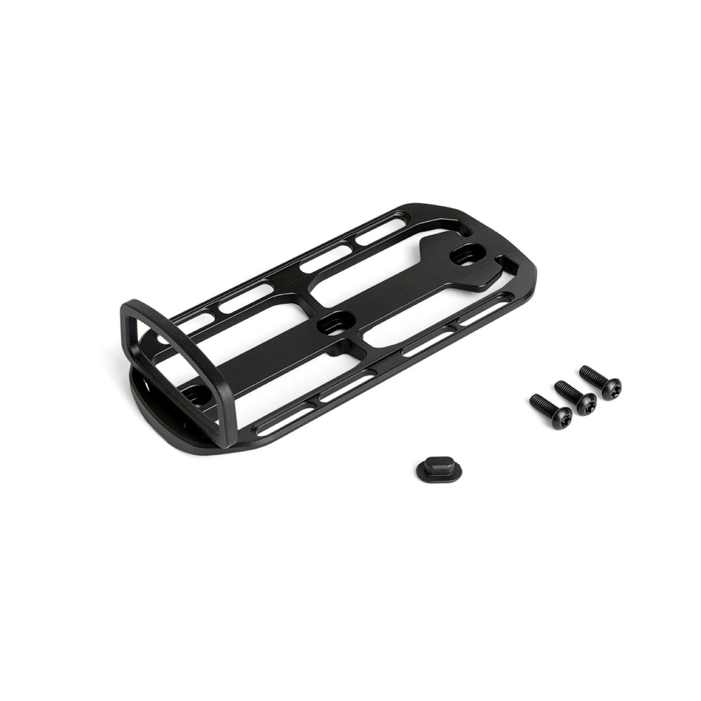 Fixplus cargo cage in black, pictures lying on a white background along side it's fixing screws and cosmetic hole cover.