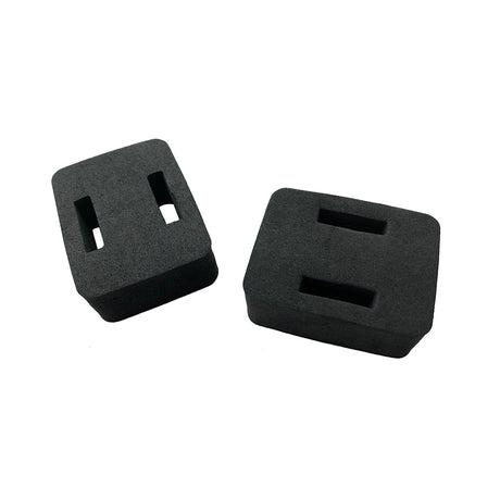 two foam blocks with two slots in each pictures on a white background